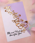 Butterfly String Dies For Card Making And Scrapbooking Dope Hollow Frame Metal Dies displayed on a purple card.