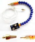 Front view of BACHIN mist coolant spray system with blue flexible hose, orange fittings, clear tubing, oil nozzle adapter
