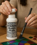 Person using 8oz Liquid Solder Flux For Stained Glass Soldering Supplies And Electrical Repairs Water Based Formula Pro Grade