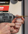 Top Shelf Exterior Trim Screws Nine By Three Inch Bronze Self Drilling Wood Fasteners Deck And Fence Toolkit Seventy Piece Heavy Duty Job Site Ready Hardware being installed with a power drill.