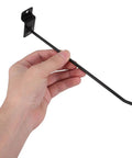 Close-up of hand holding a 20 Pack Black Iron Slat Wall Hook with 4mm Rod Thickness in polished burr free finish.