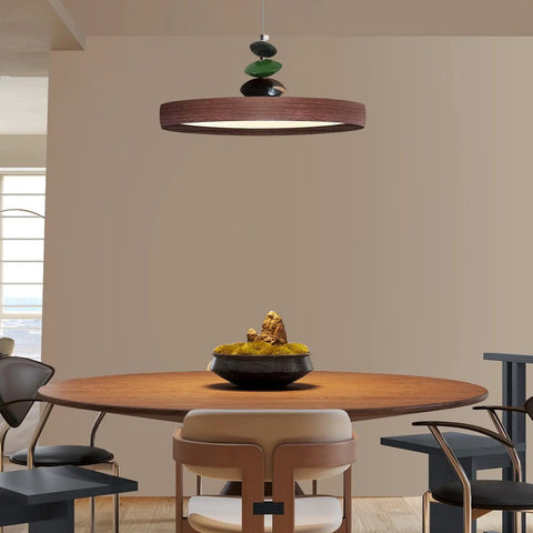 Mid Century Modern Pendant Light 15.8 Inch Wood Grain Finish Dimmable Led Island Lamp with green and black accents above dining table.