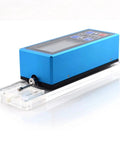 Professional Grade Handheld Surface Roughness Tester With Portable Digital Interface and Straight Up Smooth Measurements for Rapid Factory Floor Inspections or Bench Top Lab Setup, blue device with digital screen.