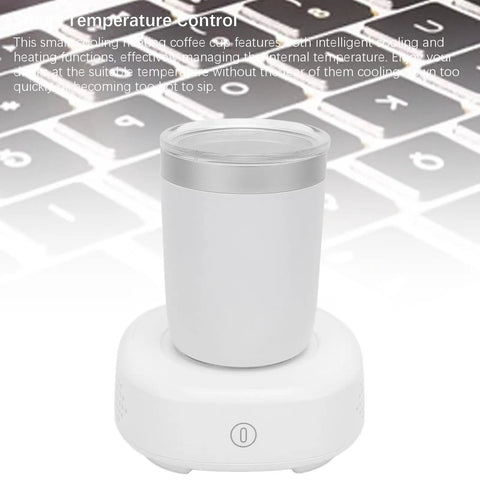 Smart Cooling Heating Mug Keeps Your Beverages Lit Or Properly Chilled On The Fly Auto Temp Control Stainless Steel Travel Cup with base on keyboard.