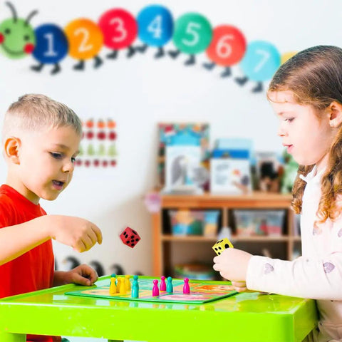 Children playing with Colorful Foam Dice Set Pack Of 24 Large 1.5 Inch Cubes In Six Bright Colors For Kid Friendly Math Games Classroom Activities And Family Game Night Soft Quiet Play For Little Hands Great Gift For Kids.