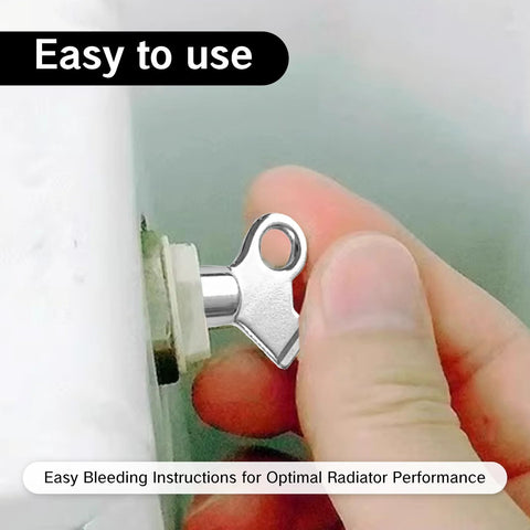 Close-up view of chrome radiator bleed key with ring handle for bleeding a home radiator air valve.