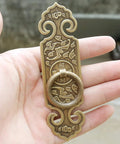 Two Pack Vintage Style Embossed Brass Drawer Pulls For Wardrobe Bookcase And Double Doors In Antique Bronze Finish in hand view