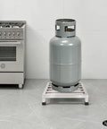 Heavy Duty Stainless Steel Shelving Three Pack Built Different For Serious Garage Storage Up To Seven Hundred Pounds Per Shelf Rust Resistant Warehouse Organization Total Knockout Deal with gray gas cylinder on rack.