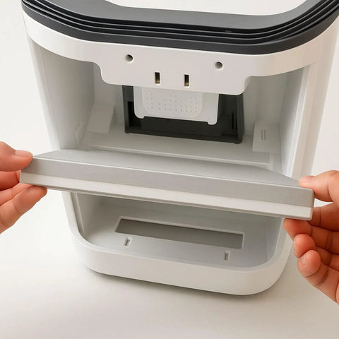 Hands inserting 3 In 1 True HEPA Replacement Filter With Activated Carbon And Pre Filter For Pure Enrichment PureZone Desktop Air Purifier