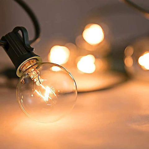 Warm white glow from G40 Replacement Light Bulbs 120V 5W Clear Globe Bulbs For Indoor And Outdoor Vibes Patio String Lights, E12 C7 base