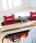 Woodworker using Benchtop Portable Router Table With Above Table Lift And Dual Sided Bit Storage for precise grooves and clean edges.