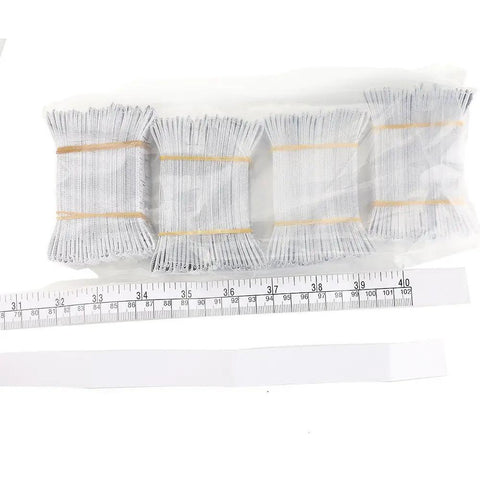 Disposable Paper Tape Measure for Medical Use 40 Inch by Three Quarter Inch Write On Tape for Recording Patient Info Baby Head Circumference Ruler Eco Friendly Coated Paper Pack of 100 displayed with packages and ruler