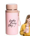 Woman holding pink 800ml Insulated Water Bottle with Tea Infuser, Leakproof Vacuum-Sealed Double-Wall Stainless Steel Flask for Gym, Travel, and Hiking