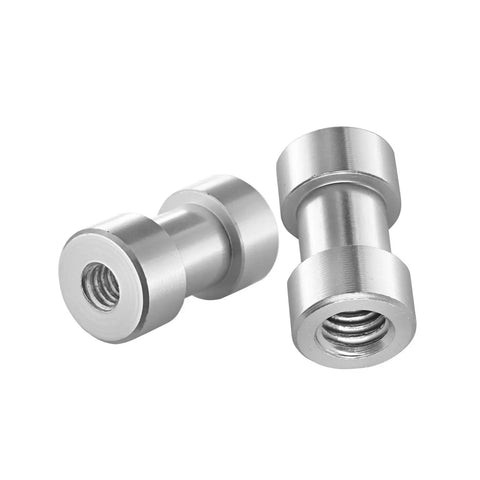 Two silver metal 1/4 to 3/8 thread converters from Knockout 15 Piece Screw Adapter Set for DSLR cameras.
