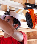 Cordless Rechargeable Fan With USB-C Charging Cord And Multiple Mounting Options For The Jobsite clipped to wood beam