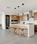Modern kitchen with white and wood decor, featuring pendant lights above island and recessed ceiling lights, 12 Pack 6 Inch Metal Recessed Can Light Trim Cover With Step Baffle Ring In White Fits Most 6 Inch Housings From Halo Elco Juno Nora Elite Commercial Electric And More Trim Only Bulb Not Included.