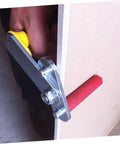 Hand using One Pair Gypsum Board Lifter And Plasterboard Carrier With Wide Grip to hold a drywall panel securely.