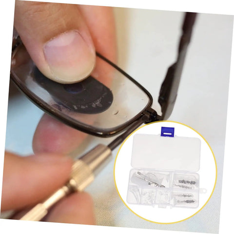 Close-up of a Two Sets Eyeglass Repair Tool Kit with screws, nose pads, ear grips, and mini screwdriver for quick fixes.