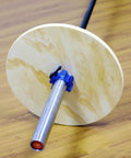 Wood Bumper Plates For Weight Lifting And Rehab Training Easy To Disassemble And Assemble Lightweight Natural Wood close-up on barbell