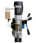 Powerful Pro Grade Automatic Magnetic Drill Press Featuring Slick Auto Feed Variable Speed And Reverse Control For Knockout Precision Holes On Heavy Steel And Pipe. Front view showing drill head, feed controls, and coolant tank.
