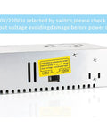 Close-up of 12V 30A 360W Universal Power Supply Adapter switch with 110V 220V AC input, showing voltage selector and warning label.