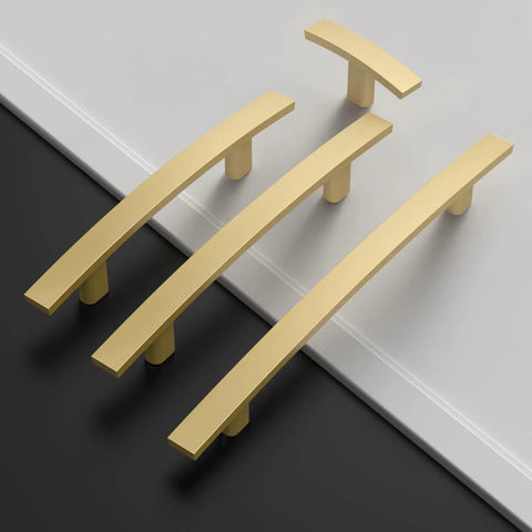 Super Dope Brushed Gold Cabinet Pulls For Kitchen And Bathroom Drawers 3 Inch Hole Centers Smooth Handle Set 10 Pack displayed on a surface.