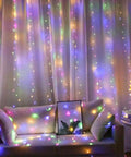 Multicolor USB Curtain Lights With Eight Modes For Indoor And Outdoor Decor behind sofa in living room setting