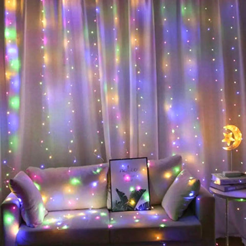 Multicolor USB Curtain Lights With Eight Modes For Indoor And Outdoor Decor behind sofa in living room setting