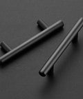 Set Of 30 Matte Black Cabinet Pulls, 5 Inch Length, 3 Inch Hole Centers (76mm), Stainless Steel Drawer Handles, top view on dark background