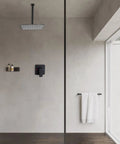 Minimalist bathroom with matte black ceiling shower system with 10 inch rain shower head, valve and trim in nickel finish.