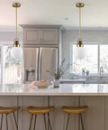 Mid Century Brushed Brass Globe Pendant Light With Milk Glass Shade for kitchen island, gold fixture above countertop