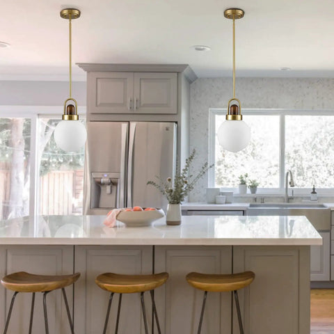 Mid Century Brushed Brass Globe Pendant Light With Milk Glass Shade for kitchen island, gold fixture above countertop