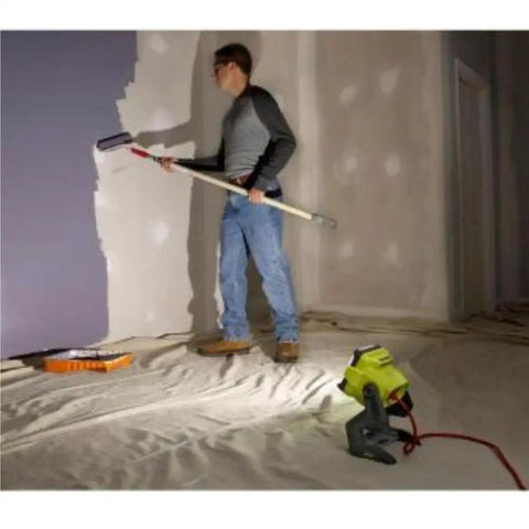 Person painting a wall illuminated by 18V Dual Power LED Work Light With 20 Watt LED And Over 1800 Lumens 360 Degree Rotating Head