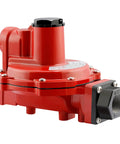 Front-angled view of red back-mount propane regulator with one-stage design and 3/4" NPT ports.