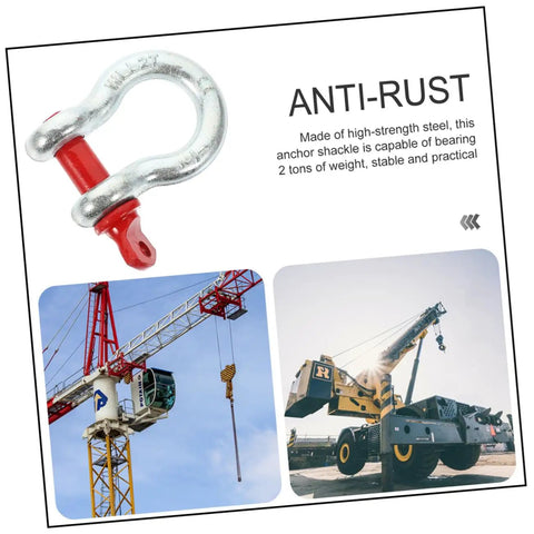 Heavy Duty Galvanized Steel Lifting Shackles Two Pack Iron Strong Hardware Built Tough For Truck Towing Off Road Recovery Quick Release Pin Heavy Load Haulin Operations, shown on a background of construction equipment.