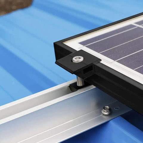 Built Like A Tank Black Aluminum Solar Module Mounting Kit With Center End Clamps and Premium Stainless Steel Screws For 30Mm 35Mm 40Mm Panels, close-up view of clamp on solar panel.