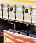 Close-up of vehicle gate latches, showcasing hardware function, not related to Beefy Heavy Duty Weld On Door Hinges 2 Pack.