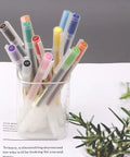 Ultra Fine Point 0.38mm Gel Pens Set, 12 Dope Colors For Note Taking displayed in a transparent holder with visible pen tips.