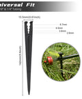 Image of a black drip irrigation stake measuring 5.79 inches, showing universal fit for 1/8 and 1/4 inch tubing, securing emitter.