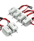 10 Pcs DC Motors 1.5V To 6V Type 130 Tiny Miniature Electric Motors With Male Dupont Jumper Wires arranged on white surface
