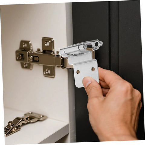 Cabilock silver soft-close inset cabinet hinge installed on white kitchen cabinet door.