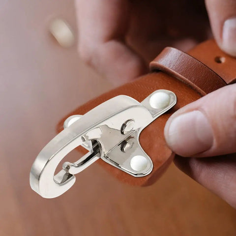 Four Pairs Of Silver Zinc Alloy Web Joint Buckles For Crafts, Built Tough To Beat Wear And Tear, Adjustable Airplane Style Buckles For DIY Projects, Perfect For Belts, Straps, Bags, And Garments. Silver zinc alloy airplane-style buckle on brown leather strap