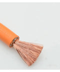 Closeup of Beefy Fifty Millimeter Electric Charging Cable Shielded Copper Core High Voltage Battery Harness with exposed copper strands.