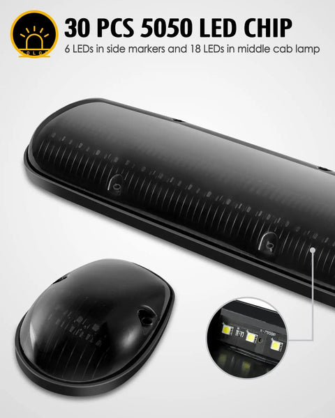Close-up view of Three Piece Smoke Lens 30 LED Cab Marker Lights Kit with wire pack, showing black smoke lens and LED arrangement.