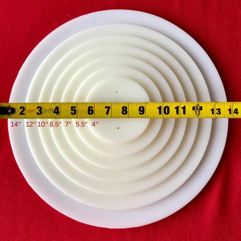Air Filter Cleaner XL Kit For 6 To 14 Inch Filters, circular filter measurement with yellow tape against red background
