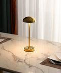 Cordless LED Table Lamp With Touch Sensor, Dimmable Brightness and Three Color Modes, on dining table with marble top.