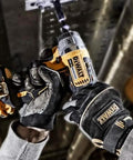 Close-up of Heavy Duty 18V Brushless Cordless Drill And Impact Driver Combo Kit in use, featuring worker's hands and power tools.