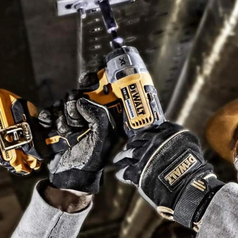 Close-up of Heavy Duty 18V Brushless Cordless Drill And Impact Driver Combo Kit in use, featuring worker's hands and power tools.