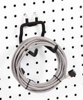Heavy Duty Pegboard Hooks And Drill Holder Set for Tool Organization 4 Pack Peg Board Hangers with Neoprene Coated Metal shown with cable