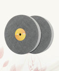 Pair of grey nylon fiber polishing wheels from 5 pack for metal and wood in automotive and aerospace use.